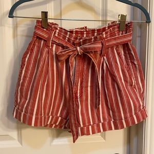 Striped tie front short with cuffed hem.